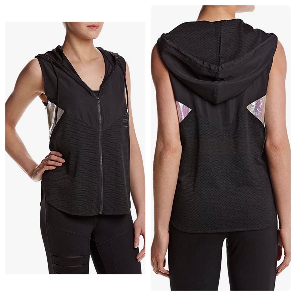 Jessica Simpson The Warmup Windbreaker Vest With Holographic Paneling.